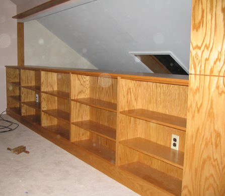 Built-in golden oak bookcase