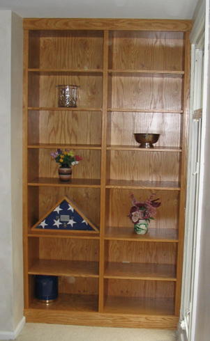 Built-in golden oak bookcase