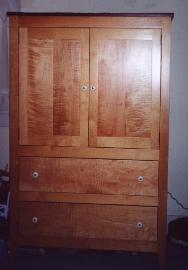 Birdseye maple and rosewood armoire